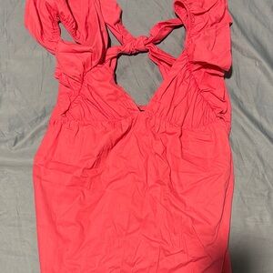 Vibrant Sleeveless baby doll dress with Bow Accent